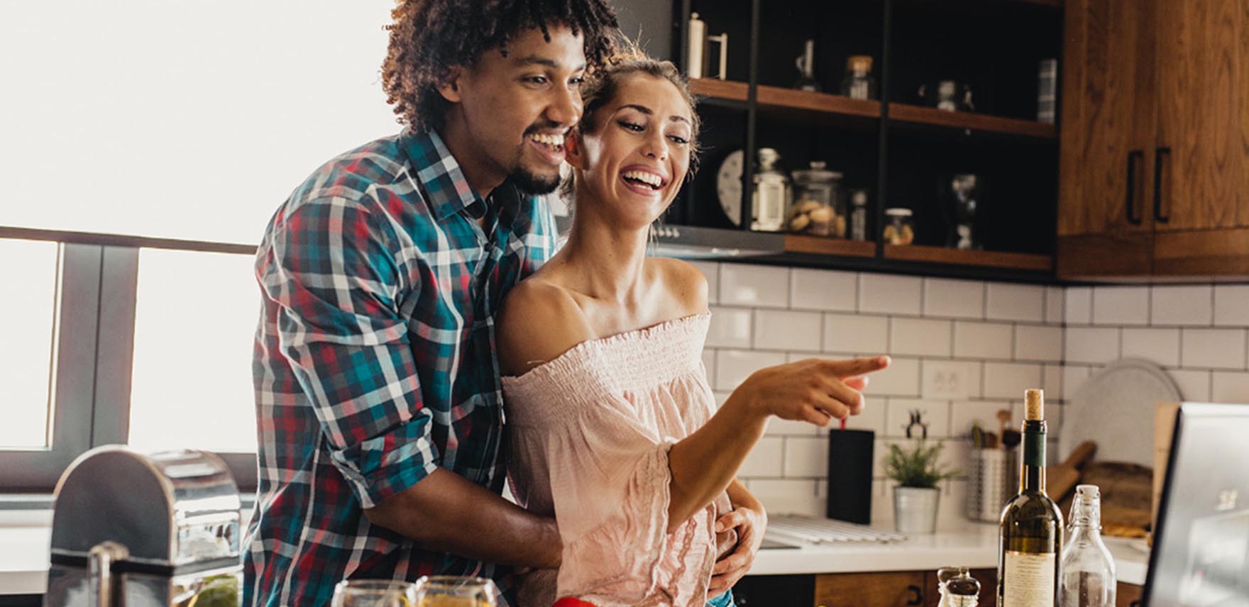 Man and woman preparing a meal together