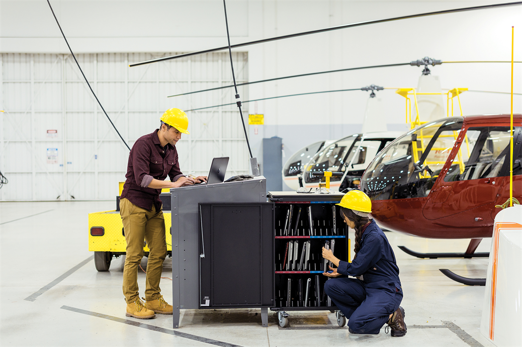 Two people working in a warehouse