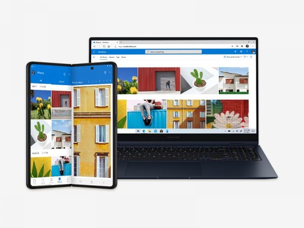 Galaxy Fold3 next to a PC showing OneDrive images on both