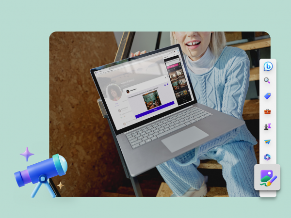 Woman holding a laptop computer up to a camera