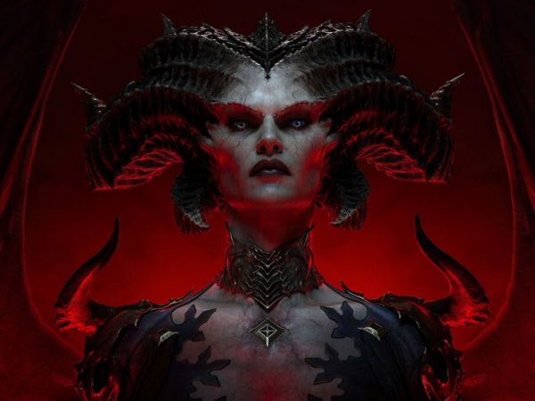 Demonic woman looking upward in front of a red background