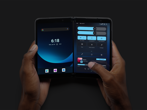 Hands holding Surface Duo