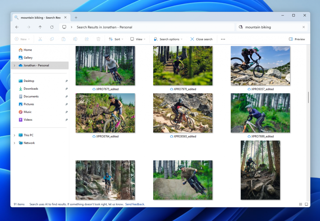 Results including mountain bike photos from the cloud in File Explorer with improved Windows Search.